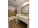 Bathroom with a shower/tub combo and a vanity with a sink at 2565 S Sheridan Blvd # 20, Denver, CO 80227