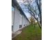 Side view of apartment building with mature trees at 2565 S Sheridan Blvd # 20, Denver, CO 80227