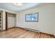 Bright bedroom with hardwood floors and ample closet space at 801 Panorama Dr, Golden, CO 80401