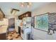 Kitchen with stove, microwave, and refrigerator at 801 Panorama Dr, Golden, CO 80401