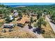 Aerial view of a home with a large yard and mountain views at 801 Panorama Dr, Golden, CO 80401