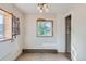 Small dining area with a window and access to kitchen at 801 Panorama Dr, Golden, CO 80401
