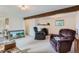 Relaxing basement recreation area with a fireplace at 801 Panorama Dr, Golden, CO 80401