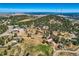 Aerial view showcasing a mountain community with surrounding landscape at 801 Panorama Dr, Golden, CO 80401