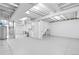 Unfinished basement with exposed utilities and painted concrete floor at 13750 W 65Th Ave, Arvada, CO 80004