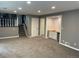 Finished basement with a wet bar and built-in storage at 3092 S Yarnell Ct, Denver, CO 80231