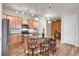 Modern kitchen with granite countertops and stainless steel appliances at 301 Inverness Way # 209, Englewood, CO 80112