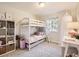 bedroom with a bunk bed and ample storage at 7591 S Xanthia Ct, Centennial, CO 80112