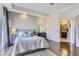 Main bedroom with ensuite bathroom access and plenty of natural light at 475 W 12Th Ave # 7G, Denver, CO 80204