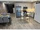 Modern kitchen with stainless steel appliances and island at 2944 Zuni St # B, Denver, CO 80211