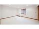 Bright and airy basement bedroom with neutral decor at 11144 Navajo St, Northglenn, CO 80234