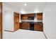 Finished basement with kitchenette and extra storage at 11144 Navajo St, Northglenn, CO 80234