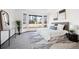 Bright and spacious main bedroom with large windows and backyard view at 11144 Navajo St, Northglenn, CO 80234