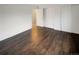 Spacious bedroom with hardwood floors and double door closet at 4635 Sable St, Denver, CO 80239