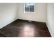 Bright bedroom with hardwood floors and a window at 4635 Sable St, Denver, CO 80239
