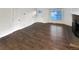 Bright living room with hardwood floors and fireplace at 4635 Sable St, Denver, CO 80239