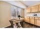 Kitchen breakfast nook with a small table and two chairs near window at 11326 Haswell Dr, Parker, CO 80134