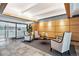 Elegant condo lobby with comfortable seating and modern wood paneling at 3131 E Alameda Ave # 1107, Denver, CO 80209