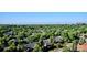 Wide aerial view of neighborhood with lush green trees at 3131 E Alameda Ave # 1107, Denver, CO 80209