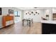 Elegant dining area with glass table and modern chairs near balcony at 3131 E Alameda Ave # 1107, Denver, CO 80209