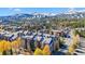 Aerial view of complex with mountain backdrop at 100 S Park Ave # 111112, Breckenridge, CO 80424