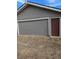 Detached garage with two doors and one entrance at 305 Strong St, Brighton, CO 80601