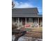 Exterior of house with covered porch at 305 Strong St, Brighton, CO 80601