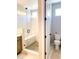 Large walk-in shower with glass enclosure and built-in seat at 3521 Mykonos Dr, Castle Rock, CO 80109