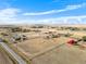 Aerial view showcasing expansive acreage at 54686 E Bobcat Ln, Strasburg, CO 80136