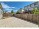 Backyard with patio and wooden fence at 25266 E Lake Dr, Aurora, CO 80016