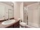 Bathroom with single sink, toilet and shower at 25266 E Lake Dr, Aurora, CO 80016