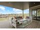 Relaxing outdoor deck with seating area and scenic views at 6196 Oxford Peak Ln, Castle Rock, CO 80108