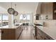 Modern kitchen with stainless steel appliances and ample counter space at 6196 Oxford Peak Ln, Castle Rock, CO 80108