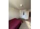 Spacious bedroom with double bed and plenty of sunlight at 15171 E 118Th Ave, Commerce City, CO 80603