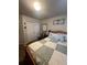 Well-lit bedroom featuring a double bed and closet at 15171 E 118Th Ave, Commerce City, CO 80603