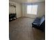 Versatile bedroom with futon and large window at 15171 E 118Th Ave, Commerce City, CO 80603