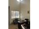Home office with large window, desk and plants at 15171 E 118Th Ave, Commerce City, CO 80603