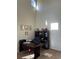 L-shaped desk, window, and built-in shelving at 15171 E 118Th Ave, Commerce City, CO 80603