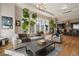 Living room with hardwood floors, fireplace and city views at 7600 Landmark Way # 1403, Greenwood Village, CO 80111