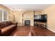 Living room featuring a gas fireplace and hardwood floors at 5104 S Jebel St, Centennial, CO 80015