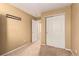 Bright bedroom with double door closet and neutral walls at 5104 S Jebel St, Centennial, CO 80015