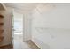 Large closet with wire shelving and wood shelving at 2715 W 86Th Ave # 21, Westminster, CO 80031