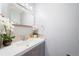 Clean bathroom with modern vanity and white sink at 9078 E Lehigh Ave, Denver, CO 80237