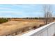 Open space view from deck, showing neighborhood and open fields at 4899 Mt Cameron Dr, Brighton, CO 80601