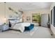 Bright main bedroom with scenic views and artistic wall decor at 6123 Buffalo Run, Littleton, CO 80125