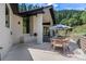 Outdoor patio with dining area and seating for relaxing at 6123 Buffalo Run, Littleton, CO 80125