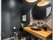 Stylish powder room with black and white tile at 6123 Buffalo Run, Littleton, CO 80125