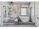 Spa-like bathroom with walk-in shower, freestanding tub, and designer tile at 6123 Buffalo Run, Littleton, CO 80125