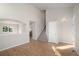 Spacious living room with hardwood floors and staircase at 5483 S Versailles St, Aurora, CO 80015