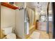 Spa-like bathroom with soaking tub, shower, and updated vanity at 925 N Lincoln St # 14C, Denver, CO 80203